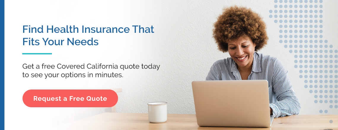 A woman with a coffee mug searches for Covered California online